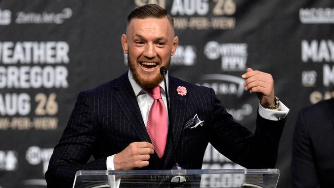 Conor McGregor speaks during a world tour press conference to promote the upcoming Mayweather vs McGregor boxing match.