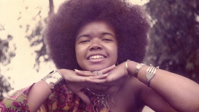 This is an image of Starla Lewis age 21, sporting her Afro hairstyle.
