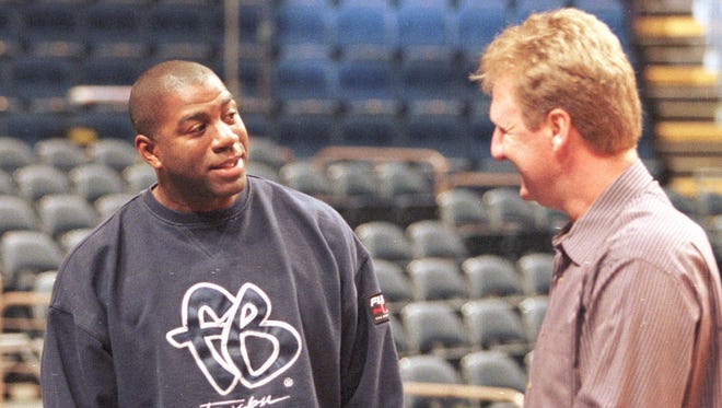 Indiana Pacers coach Larry Bird, right, jokes with Magic Johnson before the taping of a segment in Indianapolis Monday Feb. 22, 1999, on the 20th anniversary of the 1979 NCAA national championship game that featured Bird and Johnson.