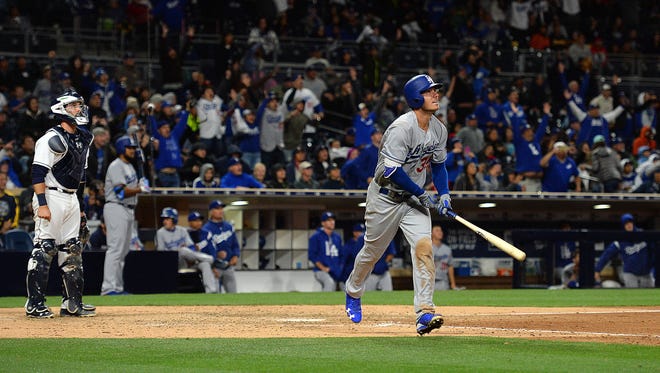 May 5: Cody Bellinger watches his second home run of the night -- a ninth inning grand slam home run.