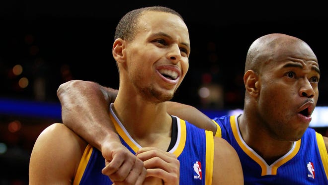 2012: Stephen Curry and Jarrett Jack react to a foul call against the Washington Wizards.