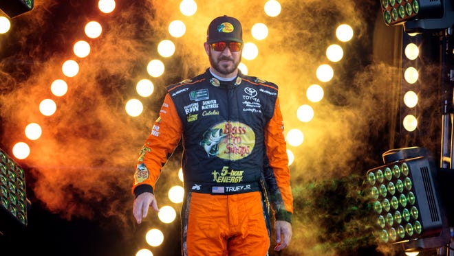 Martin Truex Jr. is introduced before the 2018 Monster Energy NASCAR Cup Series championship race at Homestead-Miami Speedway. Truex finished second in his final race with Furniture Row Racing.