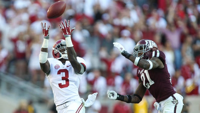 Alabama wide receiver Calvin Ridley makes a reception against Texas A&M at Kyle Field in 2015.