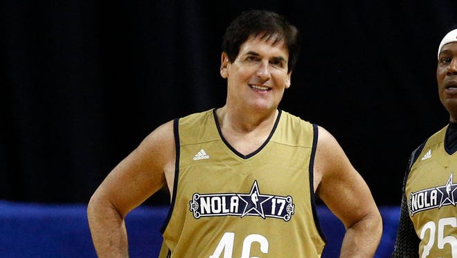 Dallas Mavericks owner Mark Cuban, recording artist Master P and Los Angeles Sparks center Candace Parker during the All-Star Celebrity Game at Mercedes-Benz Superdome.
