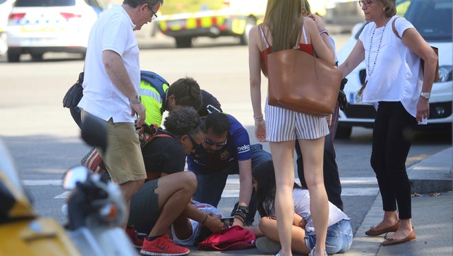 An injured person is treated in Barcelona.