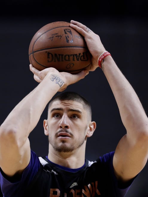 Phoenix Suns' Alex Len shoot baskets during practice the day before a game against the Dallas Mavericks at Mexico City Arena on Wednesday, Jan. 11, 2017.