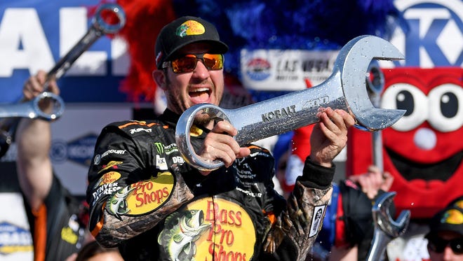 Martin Truex Jr. celebrates after winning the 2017 Kobalt 400 at Las Vegas Motor Speedway.