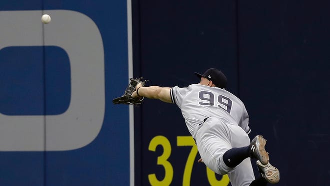 May 21: Aaron Judge makes a diving catch on a fly-out by Rays' Evan Longoria.