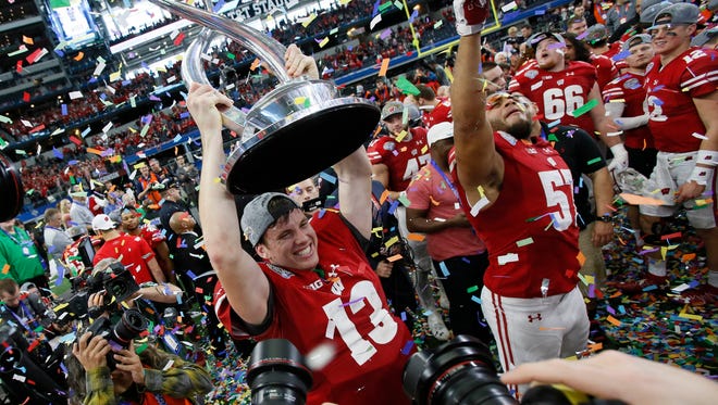 Wisconsin players celebrate after defeating Western Michigan in the 2017 Cotton Bowl.