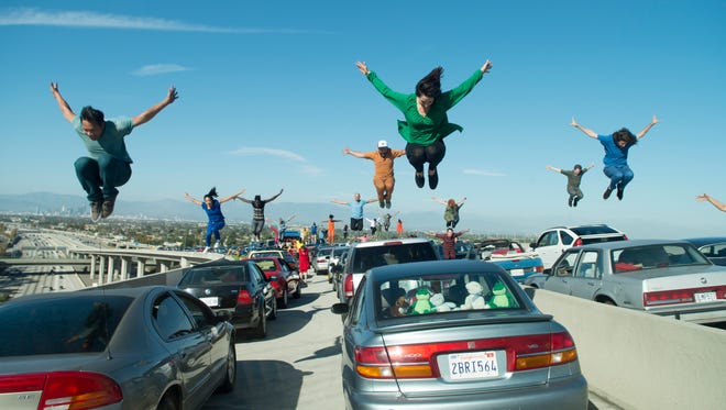 'La La Land' dancers leap in unison while filming the opening number, 'Another Day of Sun.'