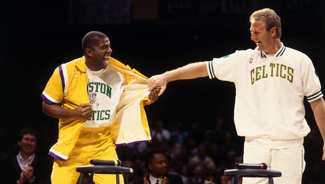 Larry Bird of the Boston Celtics with Magic Johnson of the Los Angeles Lakers during Larry Bird Night at the Boston Garden on February 4, 1993.