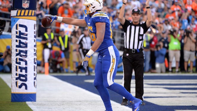 San Diego Chargers tight end Hunter Henry (86) celebrates after scoring a touchdown during the first quarter of the game against the Denver Broncos at Qualcomm Stadium.