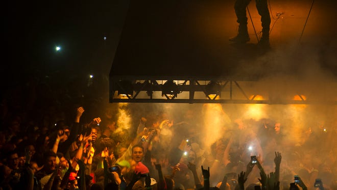 Kanye West performs at the Bridgestone Arena, Saturday, Sept. 24, 2016, in Nashville, Tenn.