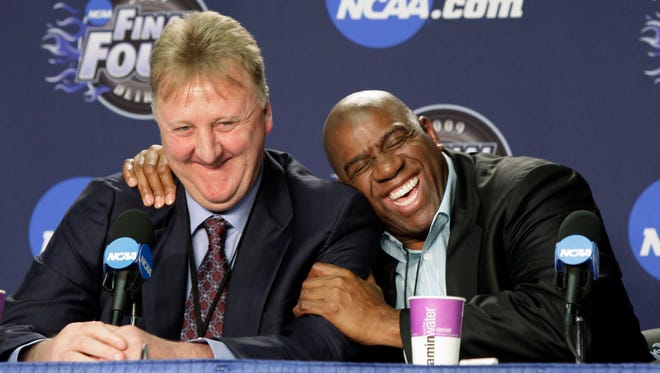 Former NBA players Earvin "Magic" Johnson, right, and Larry Bird share a laugh at a news conference before the championship game between Michigan State and North Carolina at the men's NCAA Final Four college basketball tournament Monday, April 6, 2009.