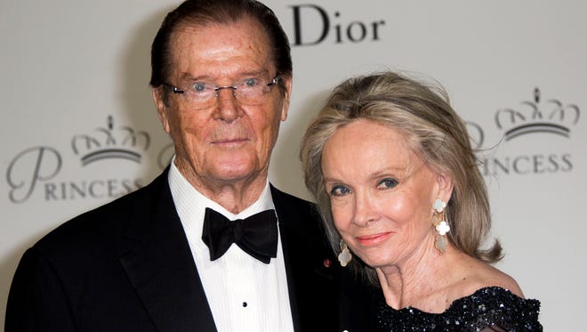 Sir Roger Moore and his wife Kristina arrive for the 2015 Princess Grace Awards Gala held at the Royal Palace in Monaco on Sept. 5, 2015.