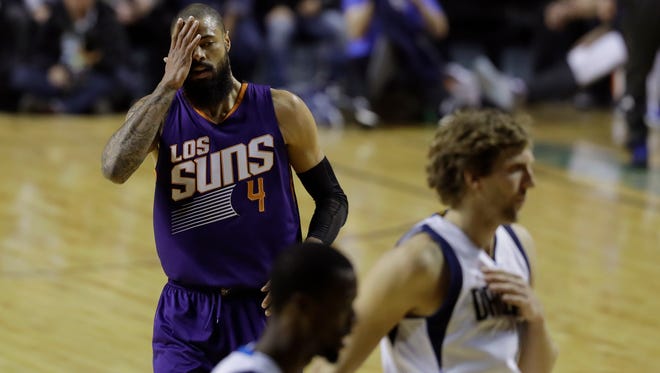 Phoenix Suns Tyson Chandler reacts to his team's missed chance to score against the Dallas Mavericks in the first half of their regular-season NBA basketball game in Mexico City, Thursday, Jan. 12, 2017.