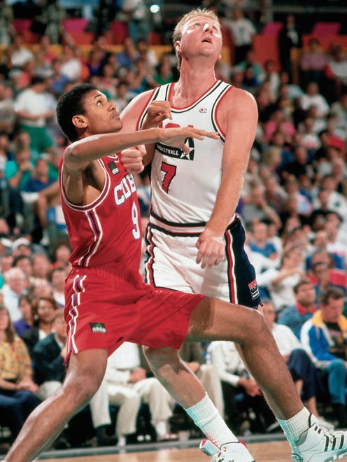 Larry Bird #7 of the United States National Team battles for position during the 1992 Summer Olympics in Barcelona, Spain.