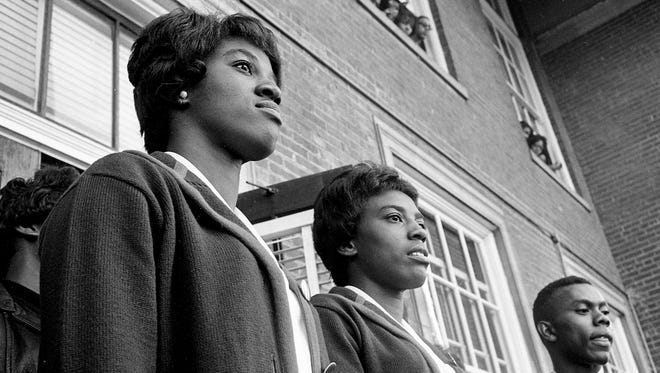 Tigerbelles stars Edith McGuire, left, and Wyomia Tyus are welcome home in a celebration on the campus of Tennessee A&I State University Oct. 28, 1964.