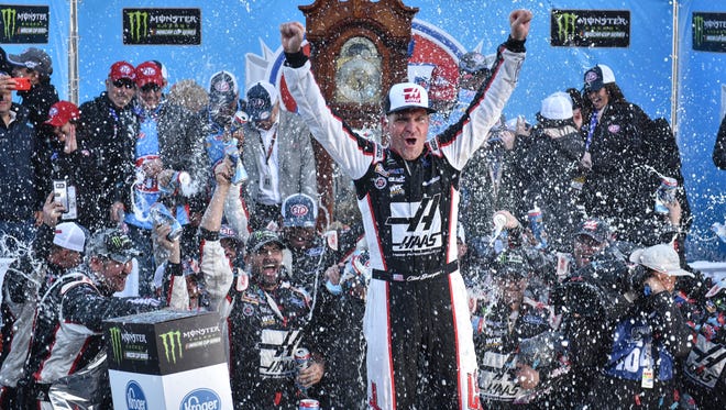 Clint Bowyer celebrates after winning the STP 500 at Martinsville Speedway in March 2018, his first victory in over five years.