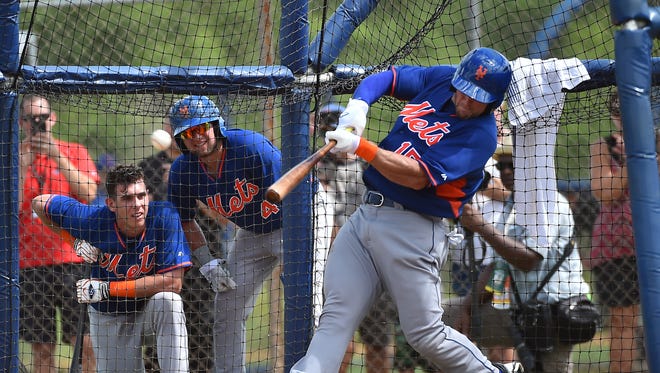 Sept. 20: Tim Tebow hits a home run in batting practice to highlight day two of Mets camp.