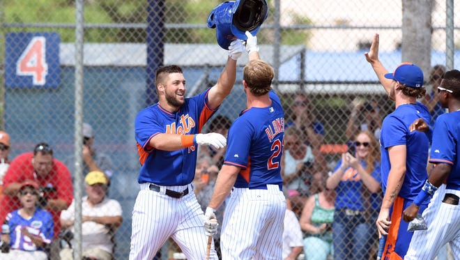 Sept. 28: Tim Tebow, greeted by his teammates, hit the home run off a fellow former Southeastern Conference athlete - John Kilichowski, 22.