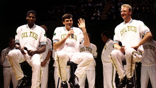 Larry Bird of the Boston Celtics with teamates Kevin McHale and Robert Parish during Larry Bird Night at the Boston Garden on February 4, 1993 in Boston, Massachusetts.