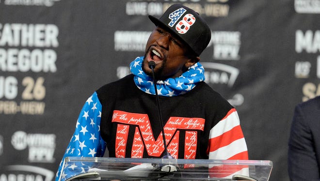 Floyd Mayweather speaks during a world tour press conference to promote the upcoming Mayweather vs McGregor boxing match.