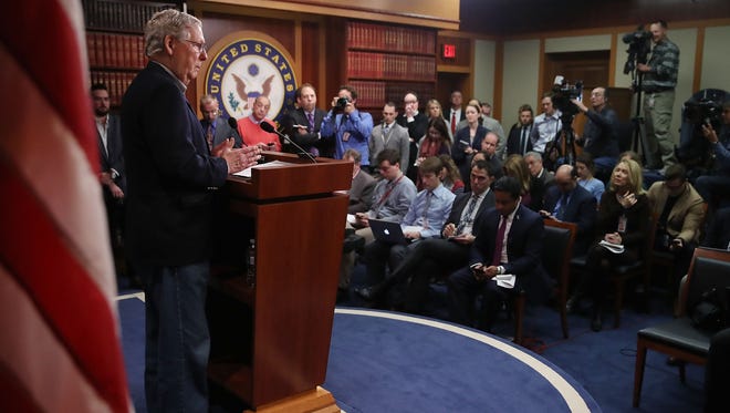McConnell speaks to reporters during a news conference at the Capitol on Dec. 12, 2016.
