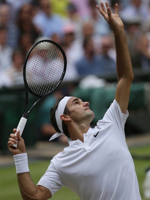 Roger Federer serves to Marin Cilic.
