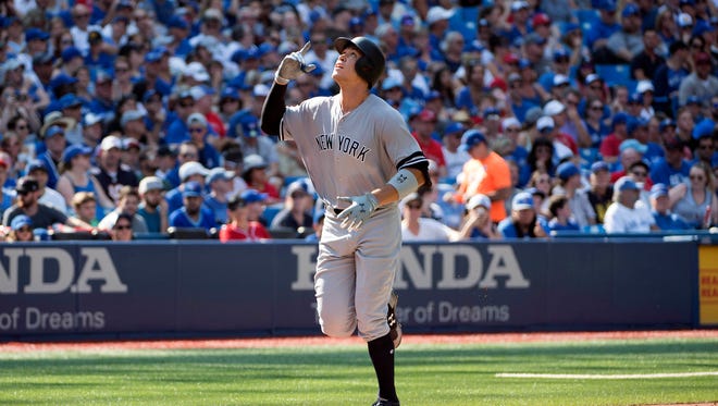 Sept. 24: Aaron Judge celebrates the first of two home runs. He has 48 on the season, one shy of Mark McGwire's rookie record that has stood since 1987.