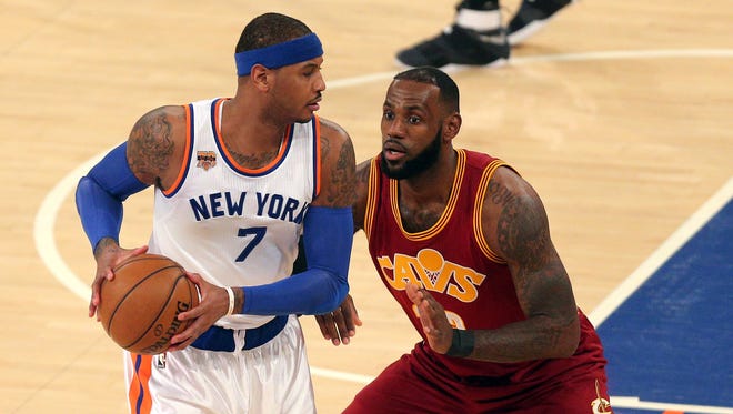 New York Knicks small forward Carmelo Anthony (7) controls the ball against Cleveland Cavaliers small forward LeBron James (23) in a recent game at Madison Square Garden.