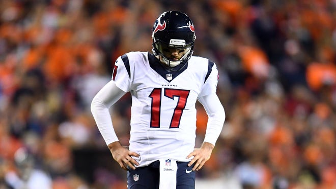 Texans quarterback Brock Osweiler laments a first-half holding penalty against the Broncos.