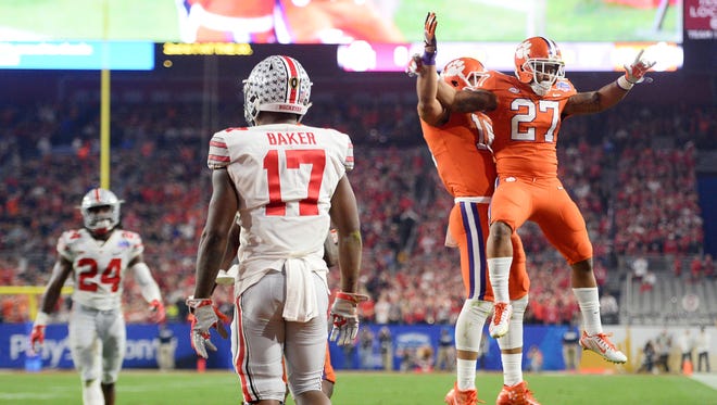 Clemson running back C.J. Fuller (27) celebrates after his TD catch to make the score 17-0.