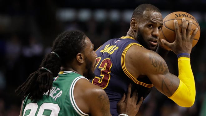 Cleveland Cavaliers forward LeBron James (23) works the ball against Boston Celtics forward Jae Crowder (99) in the second quarter at TD Garden.