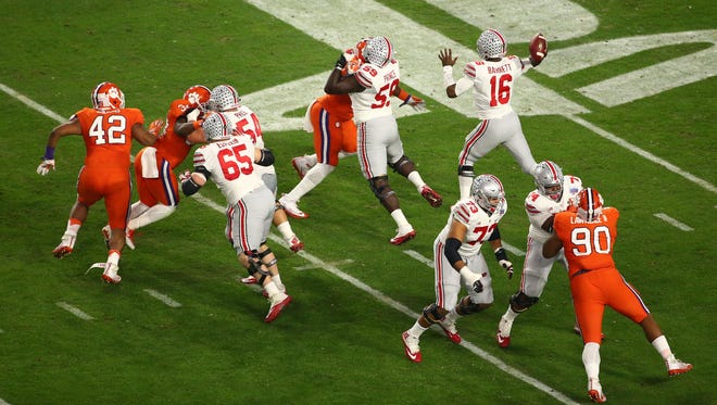 Ohio State quarterback J.T. Barrett drops back to pass.