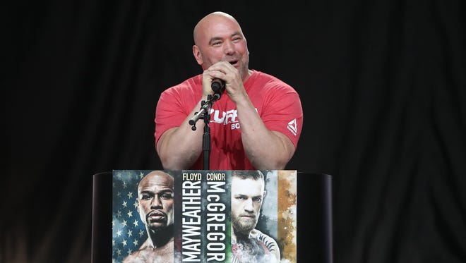 UFC President Dana White speaks at the podium before Floyd Mayweather and Conor McGregor speak during a world tour press conference to promote the upcoming Mayweather vs McGregor boxing match.