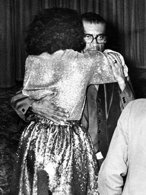 Tennessee State University track coach Ed Temple, who figures prominently in the television movie, "Wilma," was on hand for a standing ovation from the audience and an embrace from Wilma Rudolph Dec. 16, 1977. The premiere of the full-length NBC television movie was shown at the Belle Meade Theater.