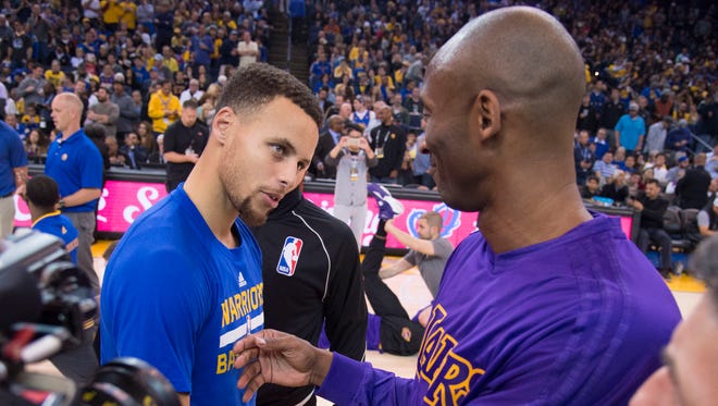 2015: Stephen Curry shakes hands with Kobe Bryant before a game at Oracle Arena.