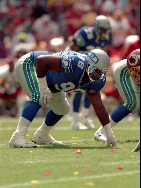 Seattle Seahawks defensive Cortez Kennedy lines up against the Redskins in 1994.