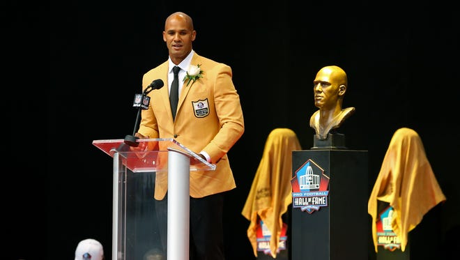 Jason Taylor gives his acceptance speech during the 2017 Pro Football Hall of Fame enshrinement at Tom Benson Hall of Fame Stadium.
