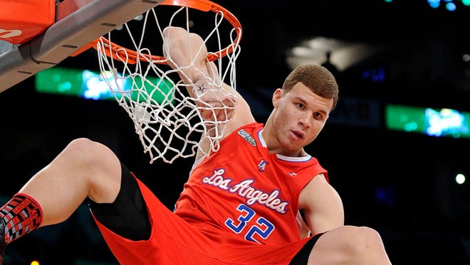 2011: Blake Griffin emulates Vince Carter's "Honey Dip" dunk 11 years prior by sticking his arm into the basket. Griffin would win the contest that year.
