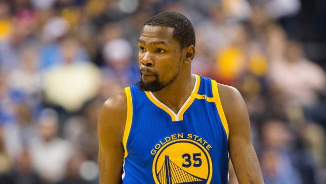 Kevin Durant looks on from the court in the first half of a game against the Indiana Pacers.
