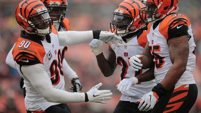 The Cincinnati Bengals' defense reacts after defensive end Michael Johnson (90) nearly came down with an interception in the first quarter during the Week 14 NFL game between the Cincinnati Bengals and the Cleveland Browns, Sunday, Dec. 11, 2016, at FirstEnergy Stadium in Cleveland. Cincinnati led 20-0 at halftime.