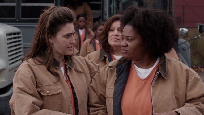 Gretchen (Lauren Adams, left) meets 'Orange Is the New Black' inmate Black Cindy (Adrienne C. Moore) in a crossover episode of Netflix's 'Unbreakable Kimmy Schmidt.'