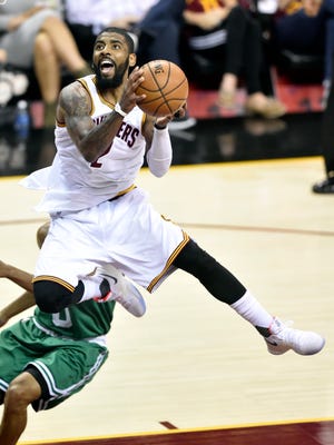 Kyrie Irving drives to the basket in the first quarter against the Boston Celtics in Game 4 of the Eastern Conference finals.