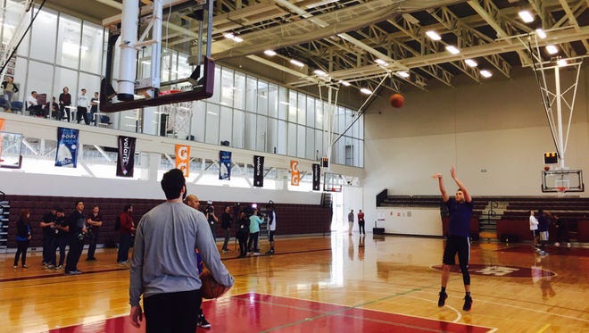Devin Booker works on his free throws during practice on Friday in Mexico City.