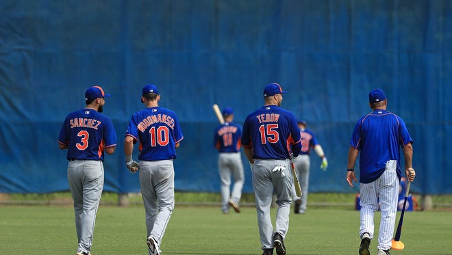 Sept. 19: Tim Tebow hits the field with the rest of his teammates.