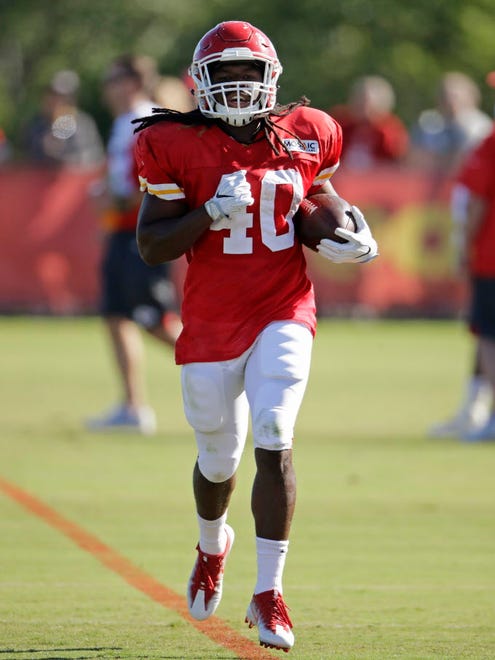 Kansas City Chiefs running back Devine Redding (40) runs with the ball during a practice.