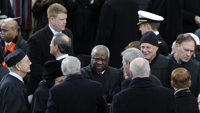 Thomas joins fellow justices at President Obama's second inauguration on Jan. 21, 2013.