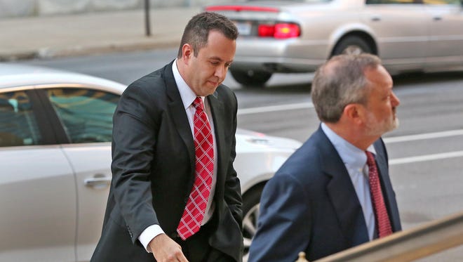Jared Fogle, left, enters the Birch Bayh Federal Building and United States Courthouse for sentencing Thursday, Nov. 19, 2015. Fogle has been transferred to a prison in Colorado.
